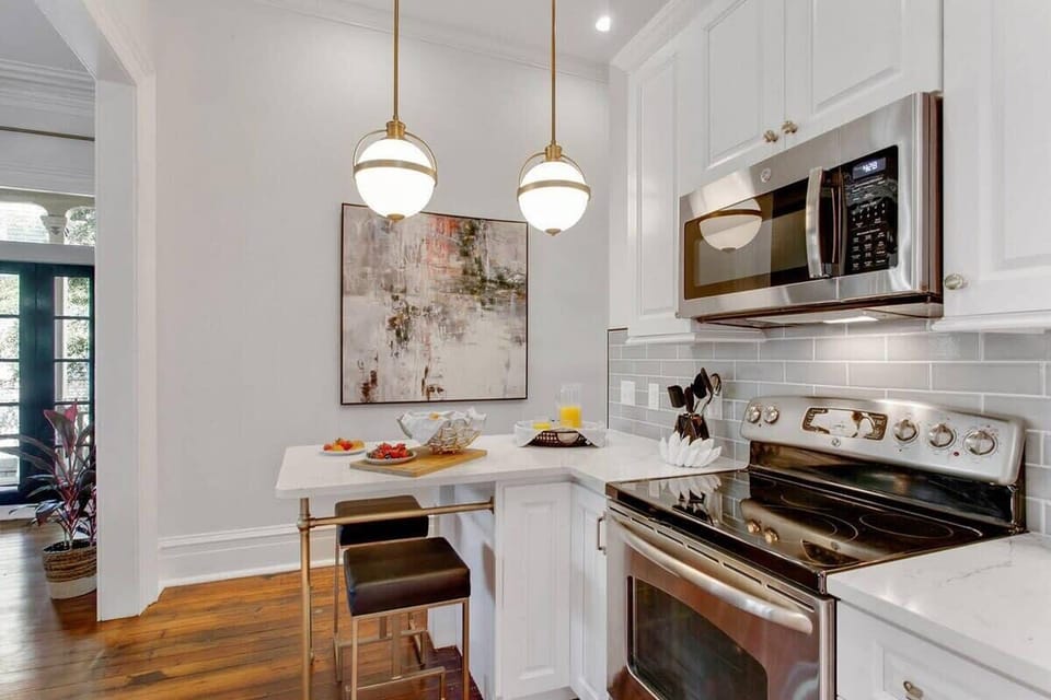 Kitchen | Fully Stocked Kitchen with Natural Light | First Floor of Building — Unit on One Level