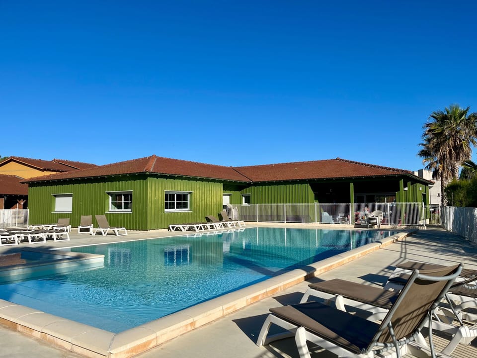 The seasonal outdoor pool is your spot to cool off before an evening stroll to the beach.