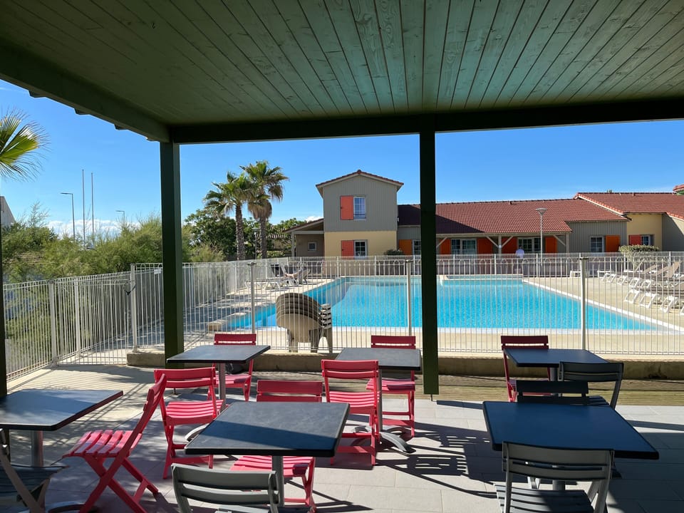 A short stroll from the petanque courts, the pool stretches out with room to swim laps.