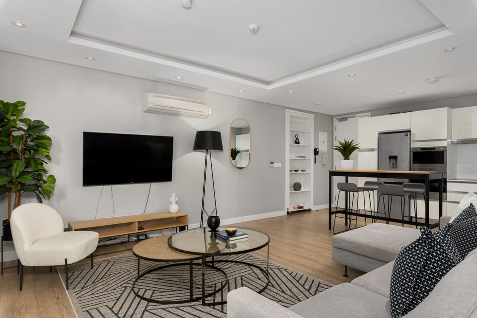 Luxury Apartment | Living area | Flat-screen TV