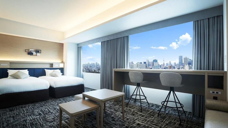 Premium bedding, down comforters, Select Comfort beds, in-room safe