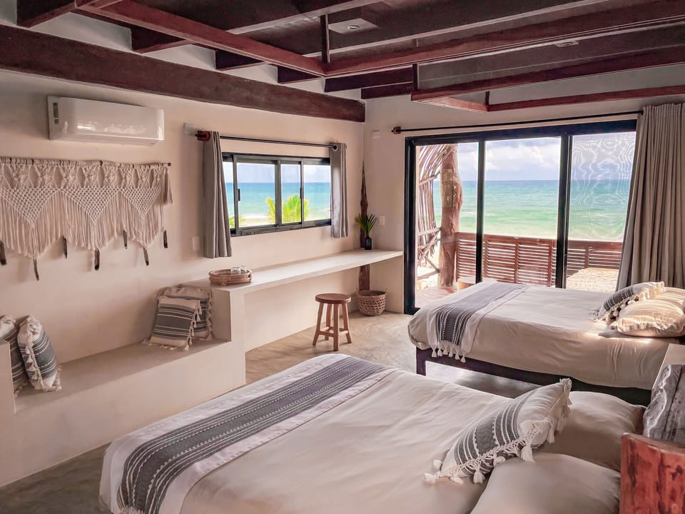Double Room with Beachfront view (with two beds) | In-room safe, WiFi, bed sheets