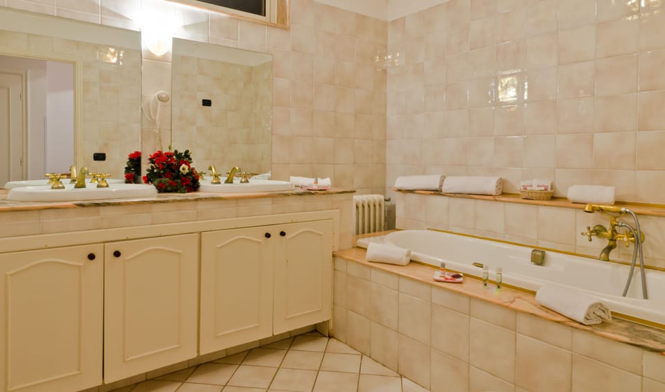 Quadruple Room, Pool Access | Bathroom | Shower, free toiletries, hair dryer, bidet