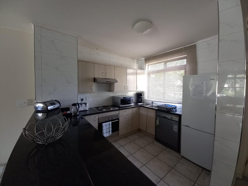 Standard Apartment, 2 Bedrooms | Private kitchen | Full-size fridge, microwave, stovetop, coffee/tea maker