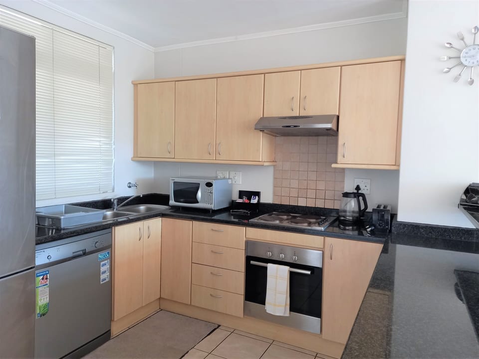 Standard Apartment, 2 Bedrooms | Private kitchen | Full-size fridge, microwave, stovetop, coffee/tea maker