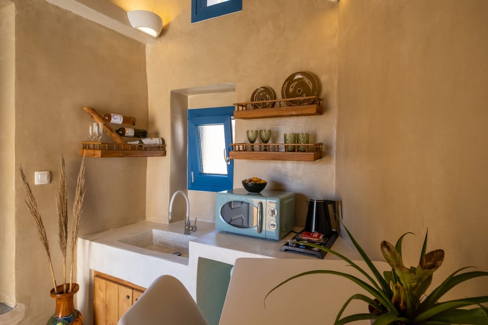 Aktea Suite with Private Hot Tub | Private kitchen | Fridge, microwave, coffee/tea maker, electric kettle