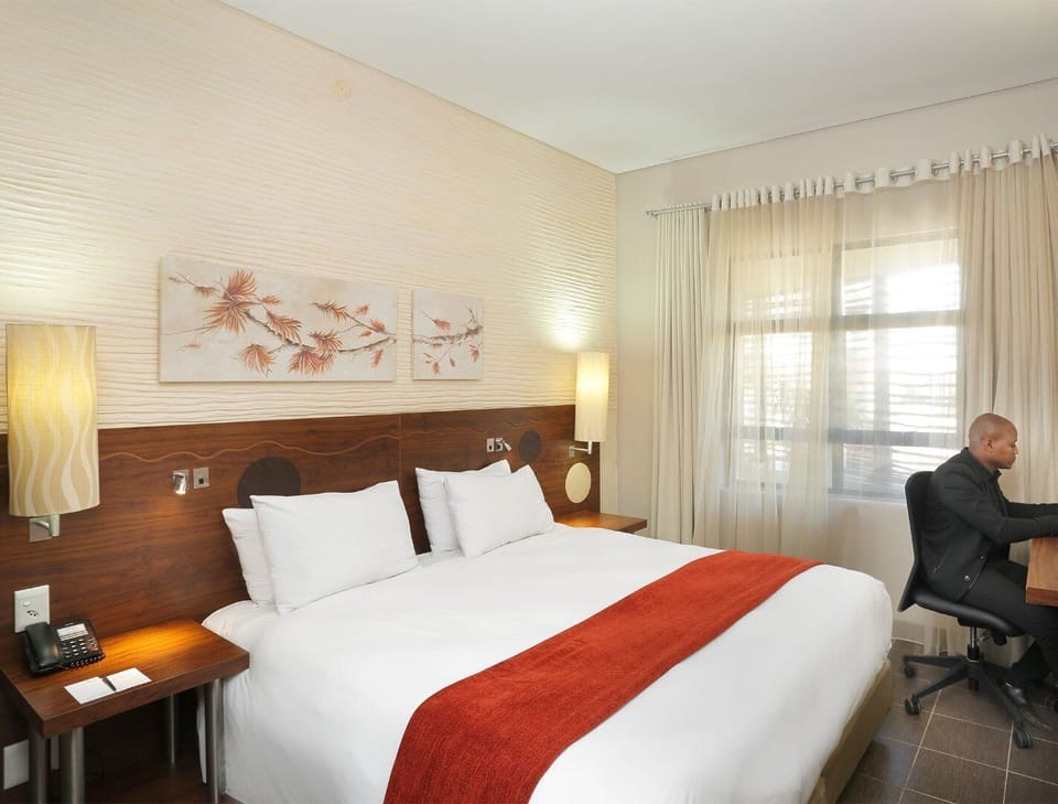 In-room safe, desk, laptop workspace, iron/ironing board