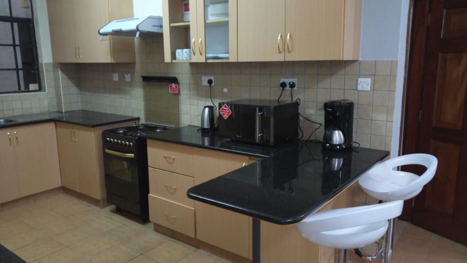 Apartment, 2 Bedrooms | Private kitchen | Fridge, microwave, oven, stovetop