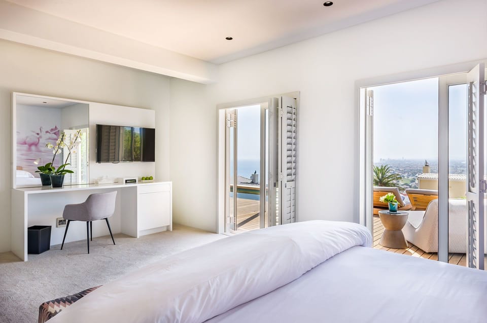 Luxury Double Room, Ocean View | In-room safe, desk, laptop workspace, iron/ironing board