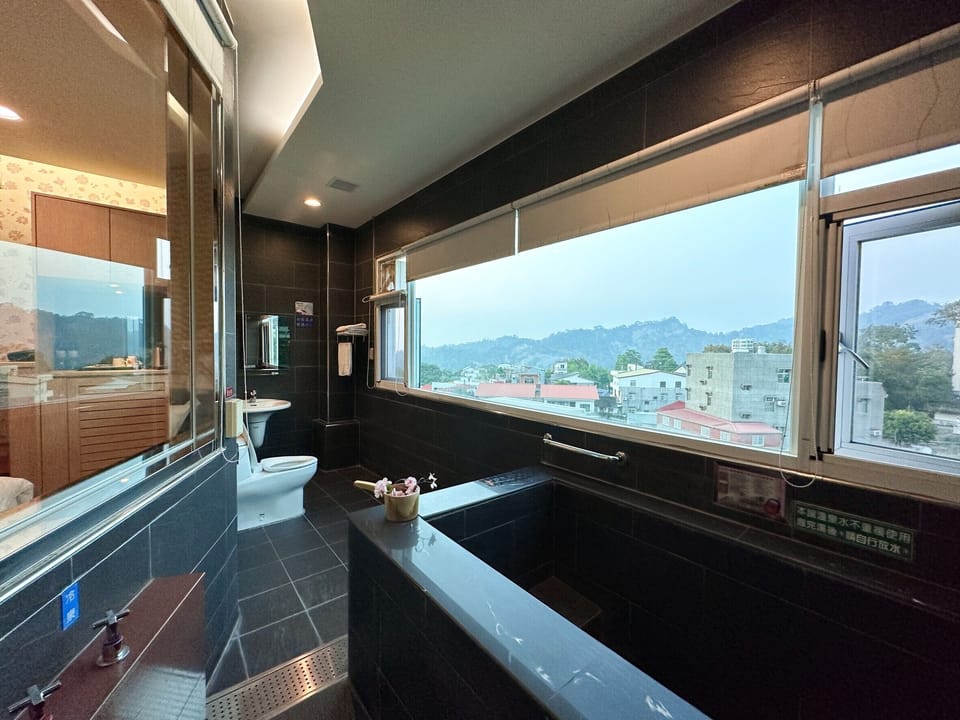 Honeymoon Room | Bathroom | Free toiletries, hair dryer, slippers, towels