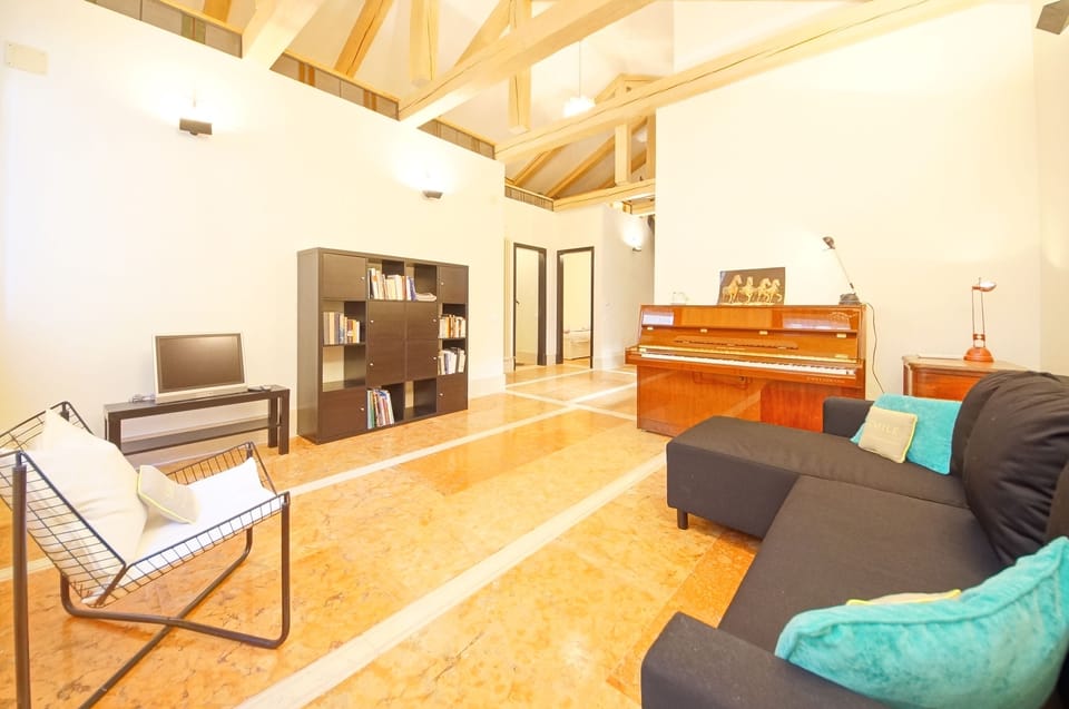 Apartment, 2 Bedrooms, Canal View | Living area | Flat-screen TV