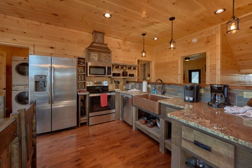Rustic chefs kitchen with stainless appliances