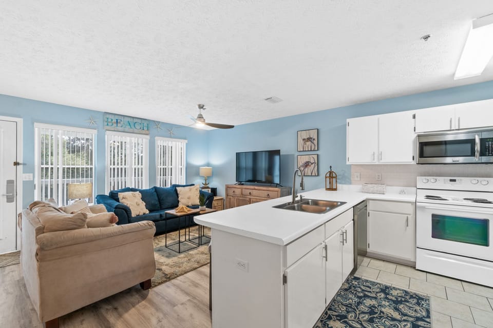 Condo, 2 Bedrooms, Resort View (D205) | Private kitchen | Full-size fridge, microwave, oven, stovetop
