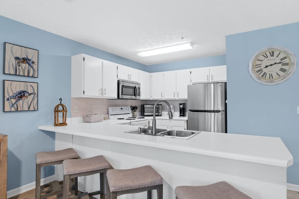 Condo, 2 Bedrooms, Resort View (D205) | Private kitchen | Full-size fridge, microwave, oven, stovetop