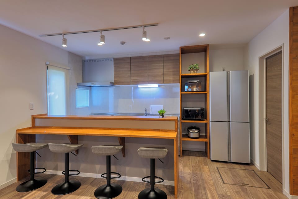 Exclusive Cottage | Private kitchen | Full-size fridge, microwave, stovetop, electric kettle