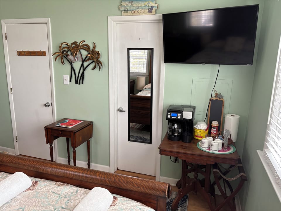 Coffee station, refrigerator, microwave, and additional seating in double room