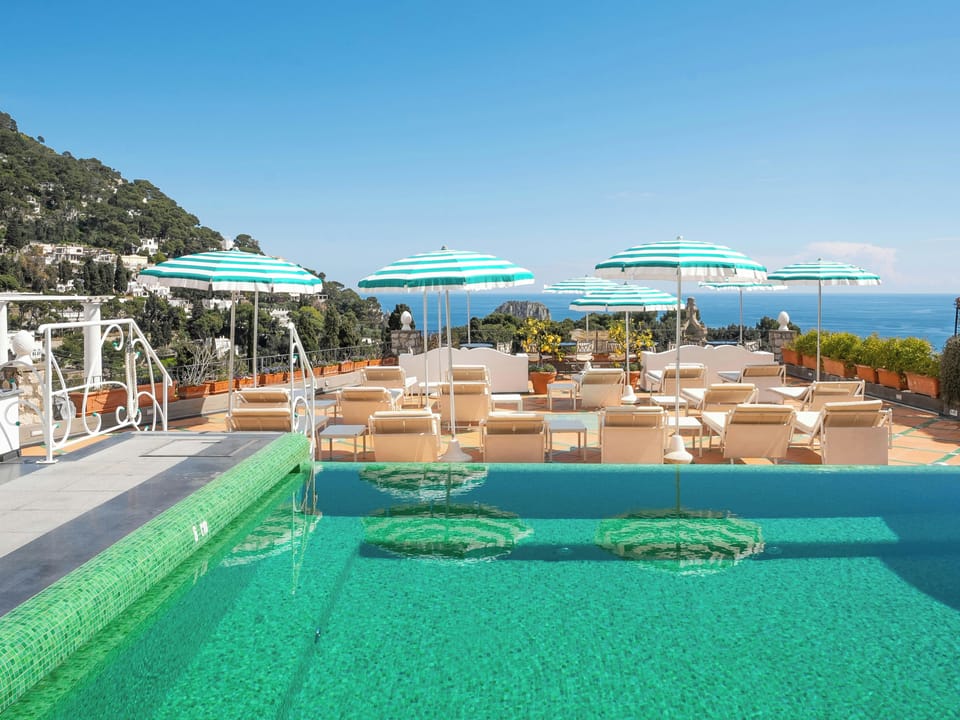 Seasonal outdoor pool, pool umbrellas, sun loungers