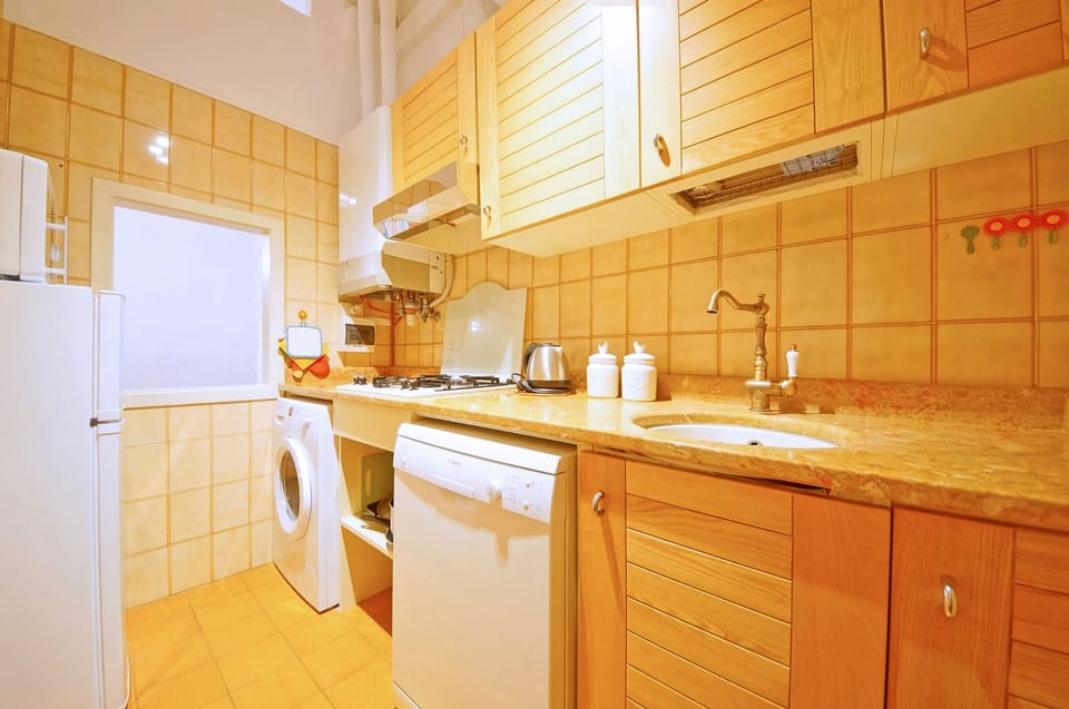 Apartment, 2 Bedrooms | Private kitchen | Full-size fridge, microwave, stovetop, dishwasher