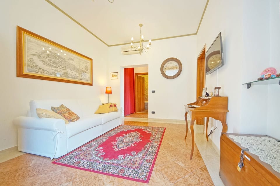 Apartment, 1 Bedroom, Canal View | Living area | Flat-screen TV