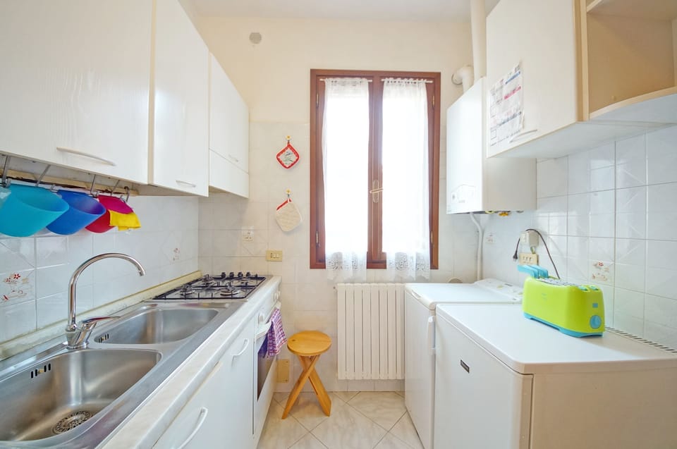 Apartment, 1 Bedroom | Private kitchen | Full-size fridge, oven, stovetop, espresso maker