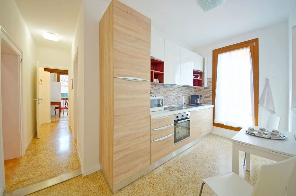 Apartment, 3 Bedrooms | Private kitchen | Full-size fridge, microwave, oven, stovetop