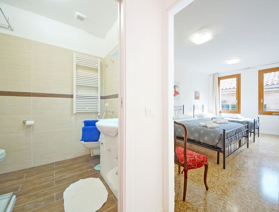 Apartment, 3 Bedrooms | 3 bedrooms, individually furnished, desk, iron/ironing board