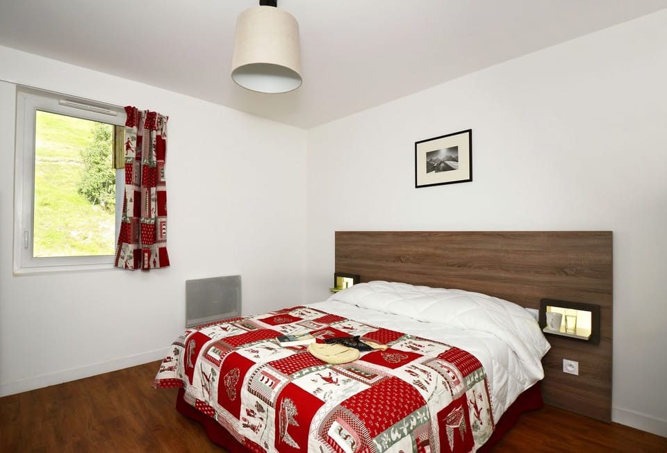 There's a Double bed in the first bedroom and 2 Single beds in the second bedroom.