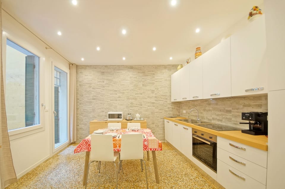 Apartment, 2 Bedrooms, Patio | Private kitchen | Full-size fridge, microwave, oven, stovetop