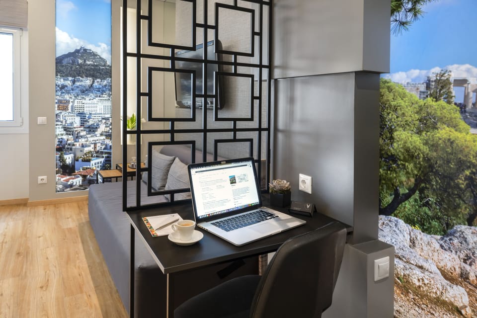 Luxury Suite | Living area | Flat-screen TV