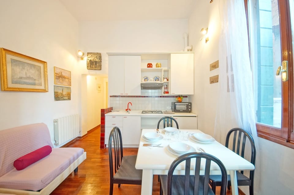 Apartment, 1 Bedroom | Living area | Flat-screen TV