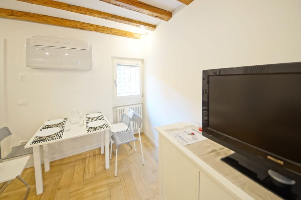 Apartment, 1 Bedroom | Living area | Flat-screen TV