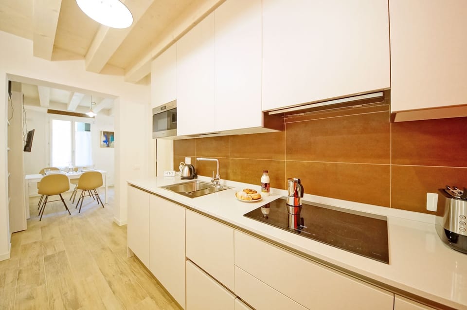Apartment, 1 Bedroom | Private kitchen | Full-size fridge, microwave, stovetop, dishwasher