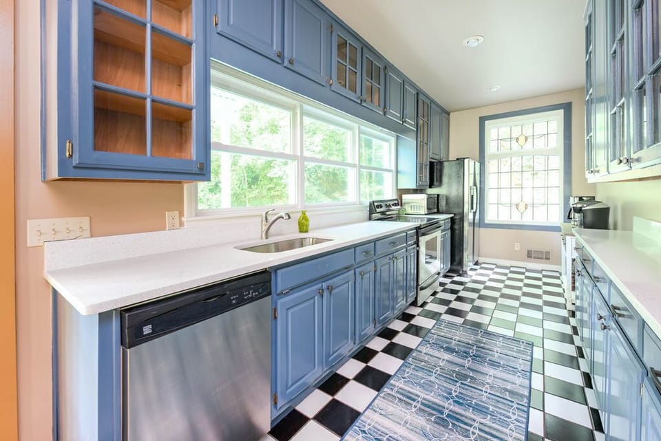 Unleash your culinary creativity in the well-stocked Riverhouse Kitchen.