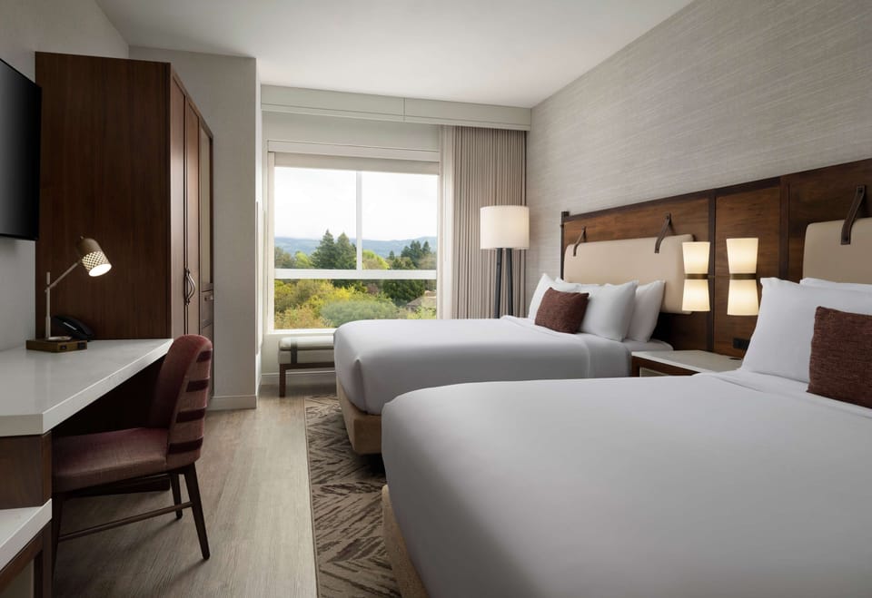 Premium bedding, pillowtop beds, in-room safe, desk