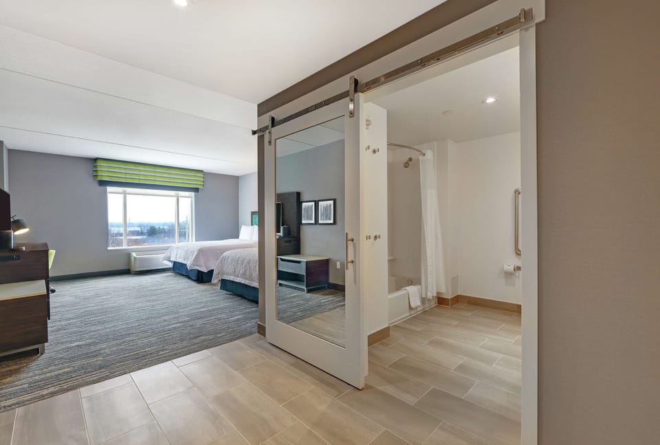 Room, 2 Queen Beds, Accessible, Bathtub (Hearing) | Bathroom | Free toiletries, hair dryer, soap, shampoo