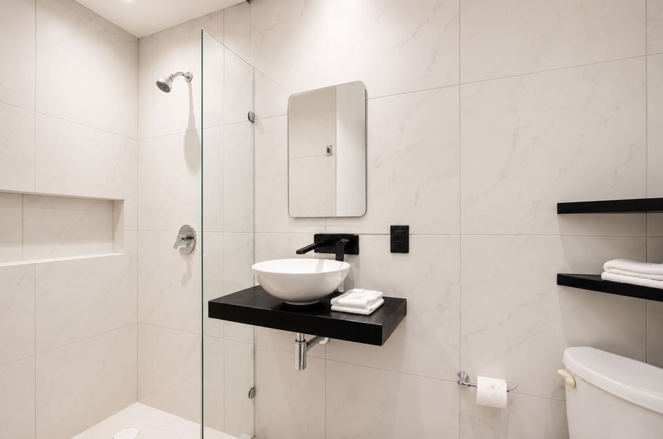 Superior Room, 1 King Bed, Balcony | Bathroom | Shower, free toiletries, towels, soap