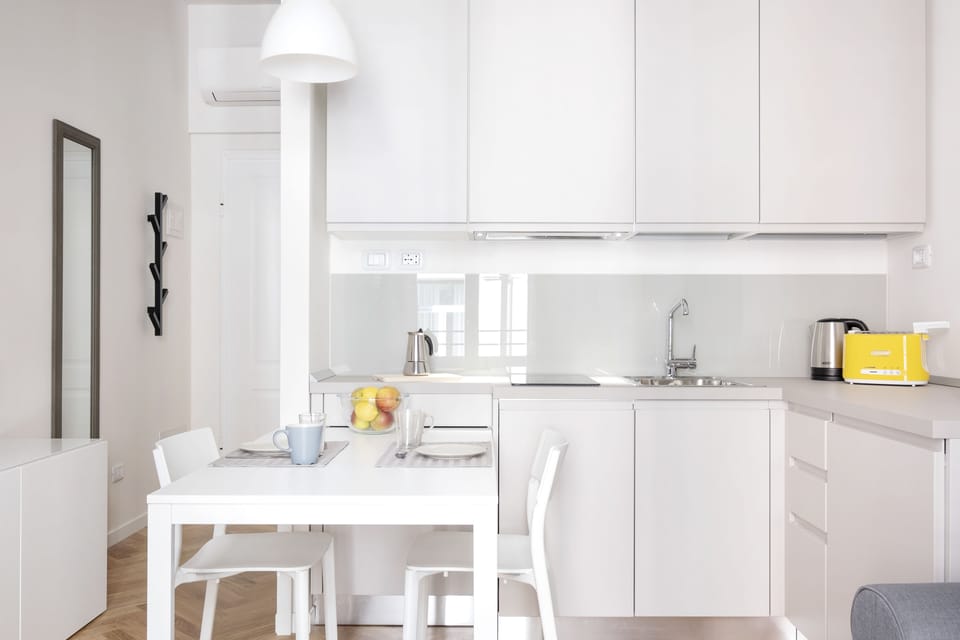 Apartment, 1 Bedroom | Private kitchenette | Fridge, stovetop, dishwasher, electric kettle