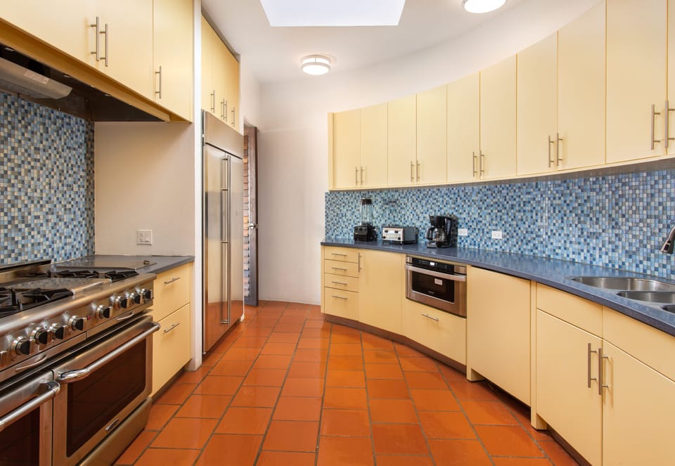 Deluxe Villa | Private kitchen | Fridge, stovetop, coffee/tea maker, electric kettle