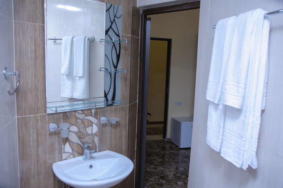 Standard Double or Twin Room, 1 Double Bed | Bathroom | Shower, free toiletries, hair dryer, bathrobes