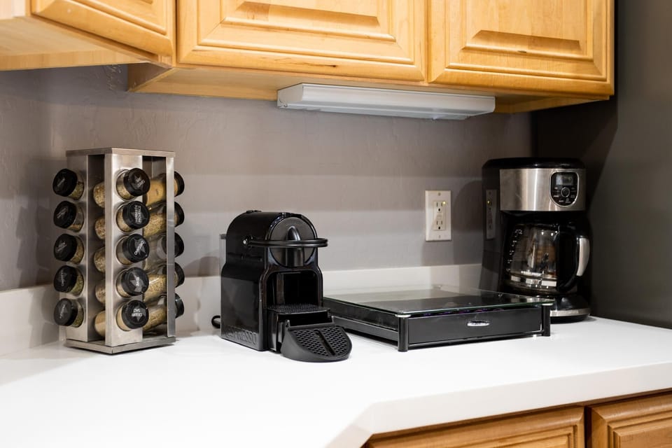 Not a morning person? We got you covered! Offering a single serve Nespresso machine and a standard coffee maker to make multiple cups! Who's the morning person now?! :)