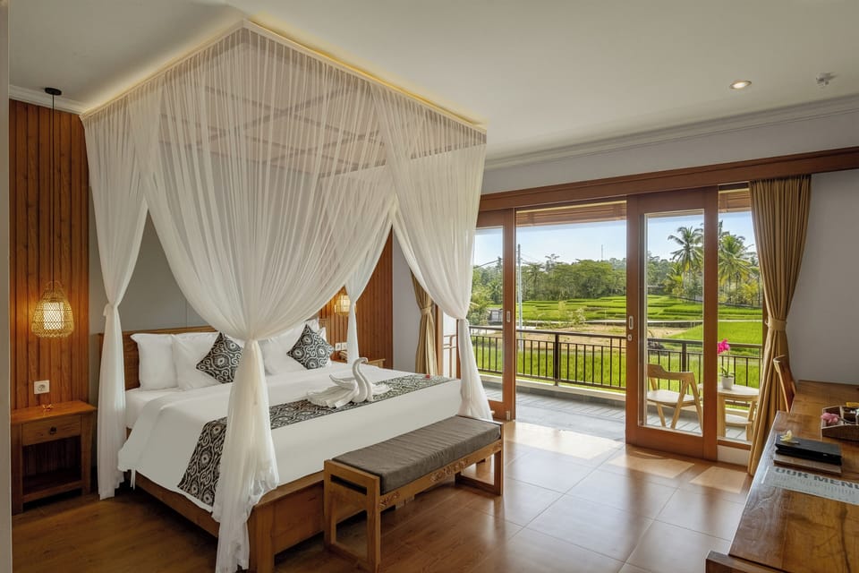 Deluxe Room Balcony with Rice Field View | In-room safe, desk