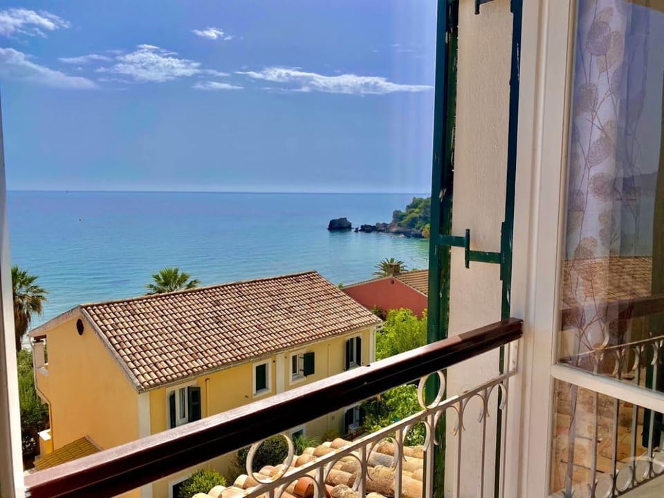 Apartment, 2 Bedrooms, Sea View | Living area | Flat-screen TV