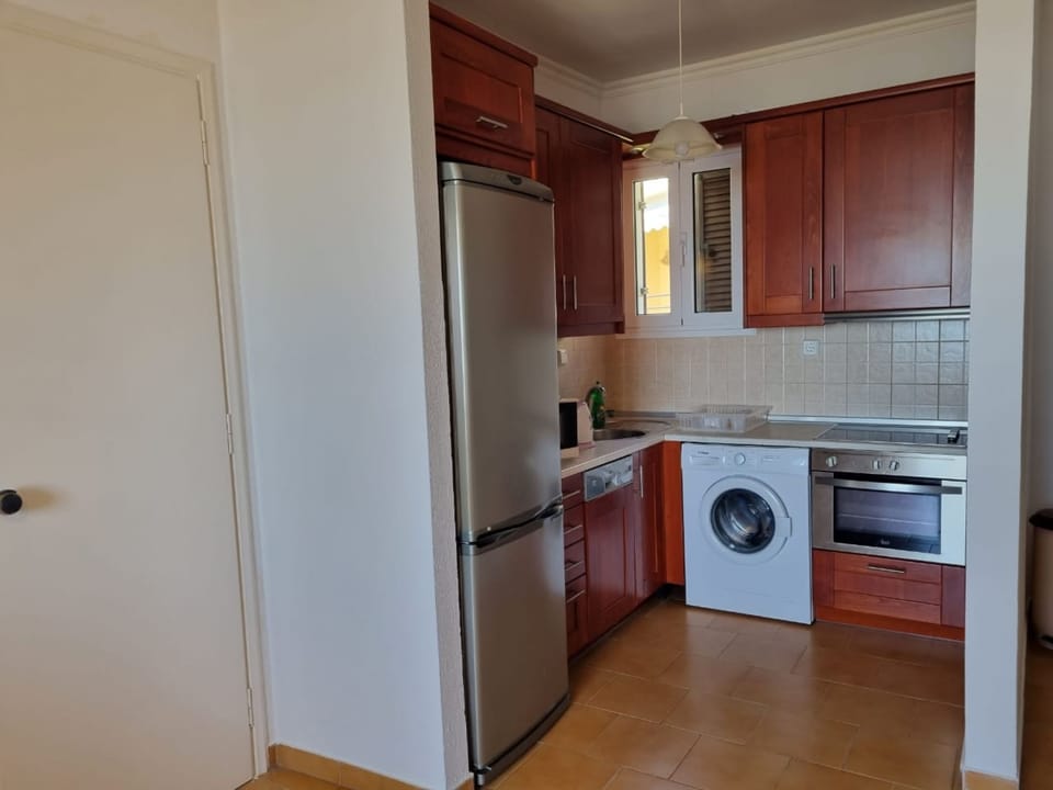 Luxury Apartment, 2 Bedrooms | Private kitchen | Full-size fridge, oven, stovetop, coffee/tea maker
