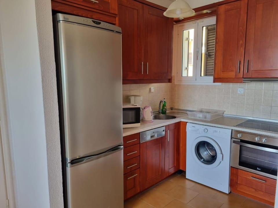 Luxury Apartment, 2 Bedrooms | Private kitchen | Full-size fridge, oven, stovetop, coffee/tea maker