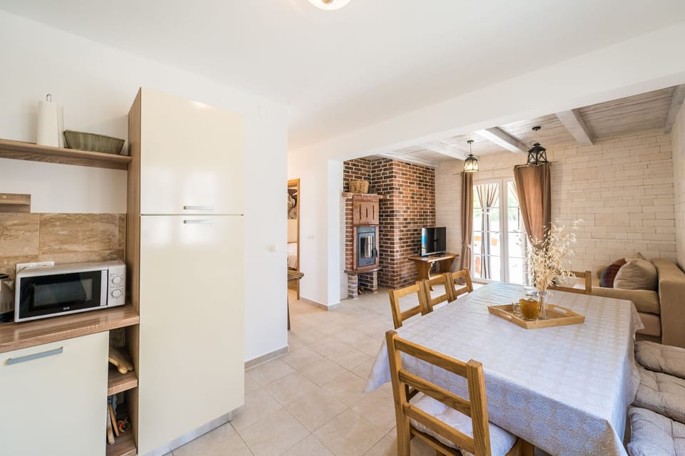 Villa | Private kitchen | Fridge, microwave, oven, stovetop