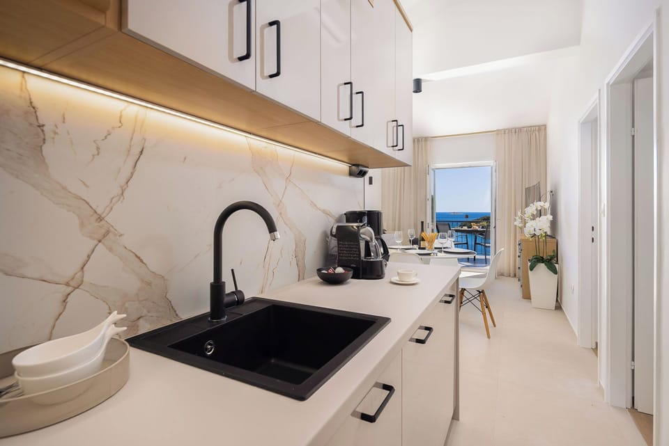 Villa | Private kitchen | Fridge, microwave, oven, stovetop