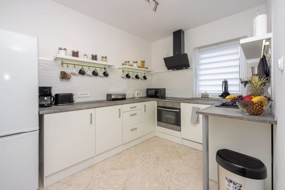 Villa | Private kitchen | Espresso maker, fridge, microwave, oven