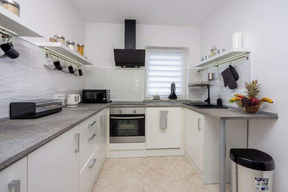 Villa | Private kitchen | Espresso maker, fridge, microwave, oven