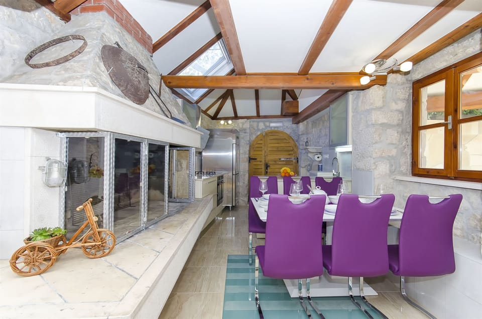 Villa | Private kitchen | Fridge, microwave, oven, stovetop