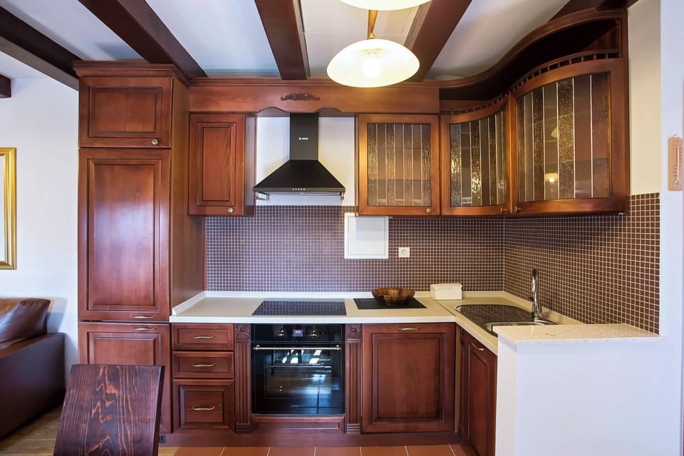 Family Suite, 2 Bedrooms | Private kitchen | Coffee/tea maker, full-size fridge, oven, stovetop